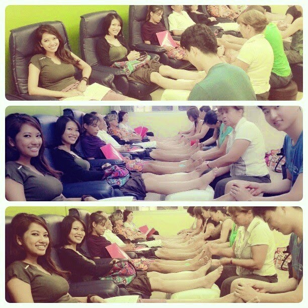 A group of people giving foot massages | Ummi Goes Where?